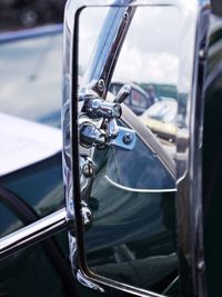 Close-up of vintage car on side-view mirror