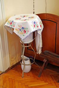 Close-up of chair on table at home