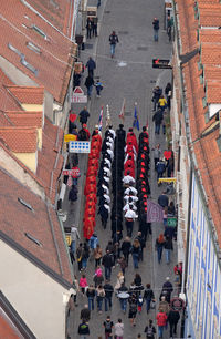 High angle view of people walking on street