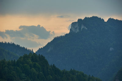 Scenic view of mountains against sky at sunset