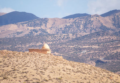 View of castle on mountain against sky