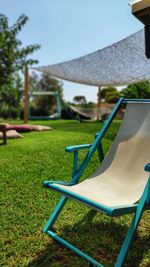 Empty chair in park