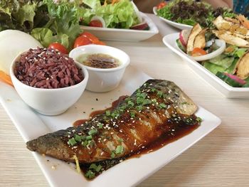 Close-up of food served on table