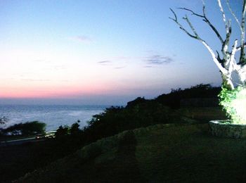 Scenic view of sea against sky at sunset