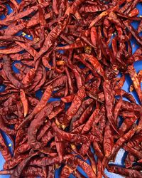 Full frame shot of red chili peppers at market