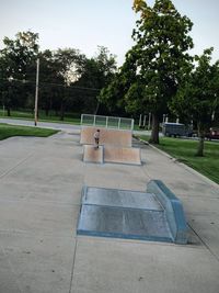 Empty park bench in park