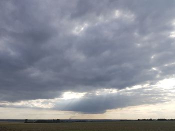 Scenic view of storm clouds over sea