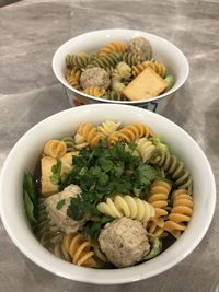 Home cooked fusilli with homemade meatballs