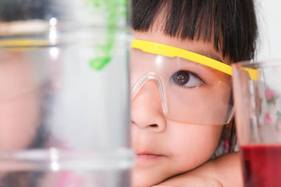 Close-up of young woman drinking glass