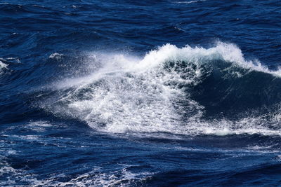 Sea waves splashing on shore
