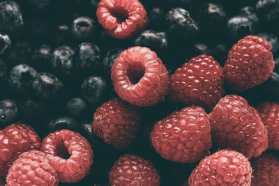 Colorful, juicy background from blackberries and raspberries. healthy food concept.