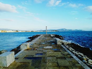 Panoramic view of the sea from a cliff in the late afternoon of summer 