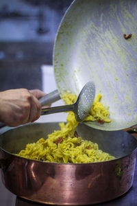 Close-up of hand holding food