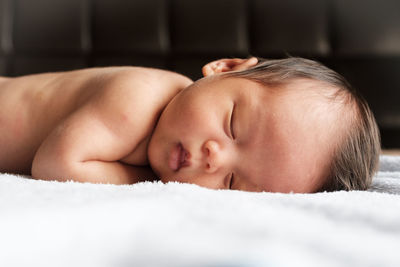 Woman sleeping on bed