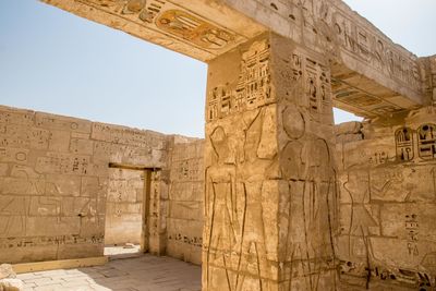 Carvings on wall at old ruins