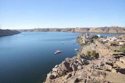 Scenic view of sea against clear blue sky