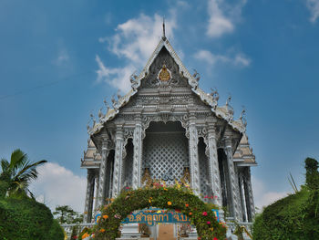 Low angle view of statue of building against sky