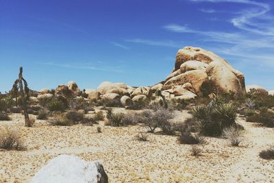 Rock formations against blue sky