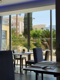 Empty chairs and table in restaurant