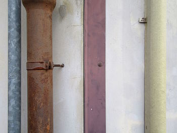 Pipes on concrete wall