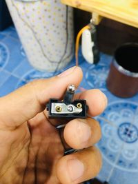 Midsection of person holding camera