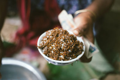 Close-up of hand holding food