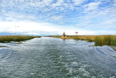 Scenic view of river against sky