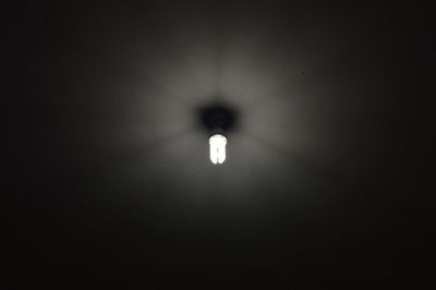 Lamp post in dark room