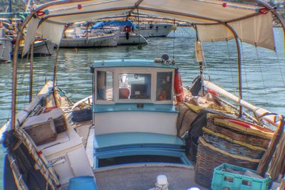 Boats moored in sea