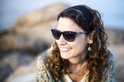 Portrait of young woman wearing sunglasses