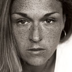 Close-up portrait of a serious young woman