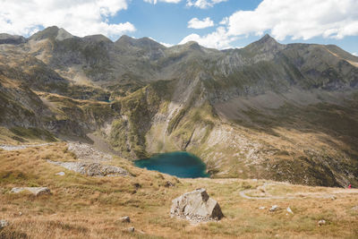 A scenic view on a blue lake in the pyrenees.