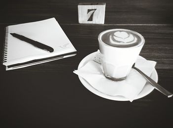 Close-up of coffee cup on table