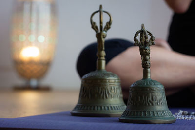 Close-up of bells on table