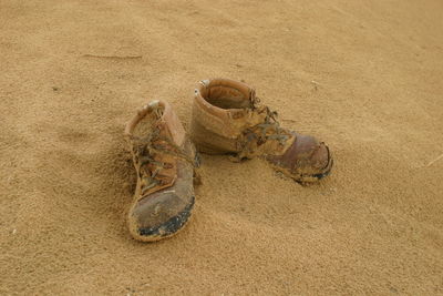 Old messy shoes at beach