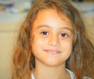 Close-up portrait of smiling girl