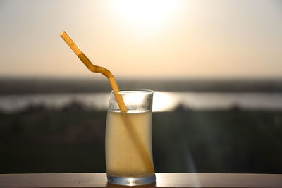 Close-up of glass of water on table