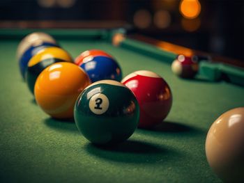 Close-up of pool balls on table