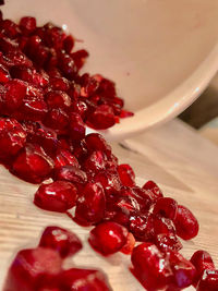 Close-up of red berries in bowl on table