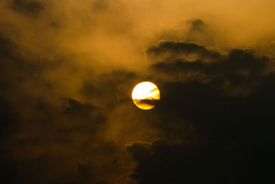 Low angle view of moon against sky at night