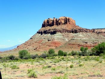 Scenic view of rocky mountains against clear blue sky