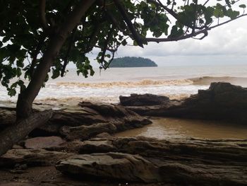 Scenic view of beach against sky