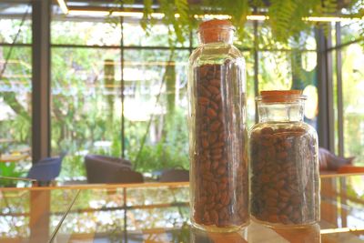 Close-up of bottles in jar
