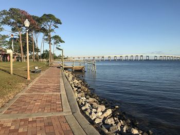 Scenic view of sea against clear blue sky