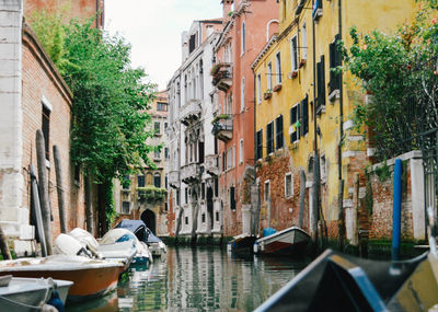 Panoramic view of boats moored in city