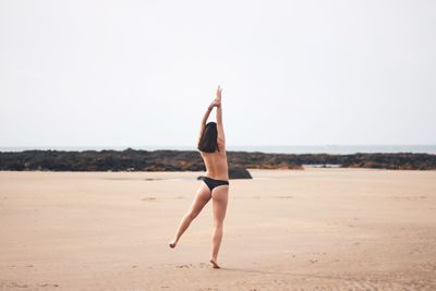 Full length of woman on beach