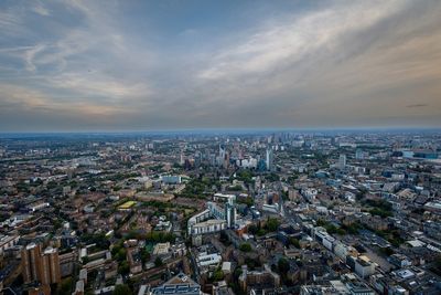 Aerial view of townscape against sky