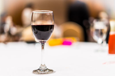 Close-up of wineglass on table