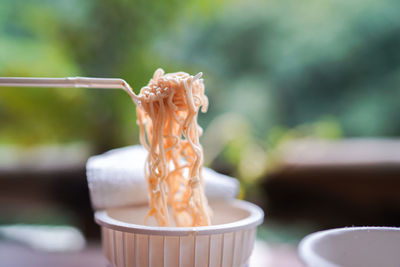 Close-up of ice cream cone on table