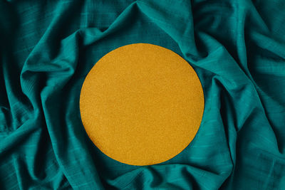 High angle view of human face on bed